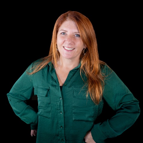 Jennifer Hagerty, owner of Mountain Ridge Realty, LLC. , smiling and wearing a black shirt