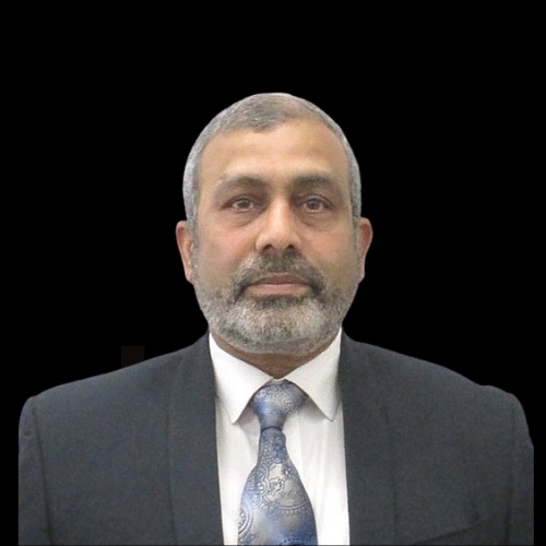 Christina Pizanias, salesperson at Mountain Ridge Realty, LLC. , wearing a black dress jacket over a white shirt